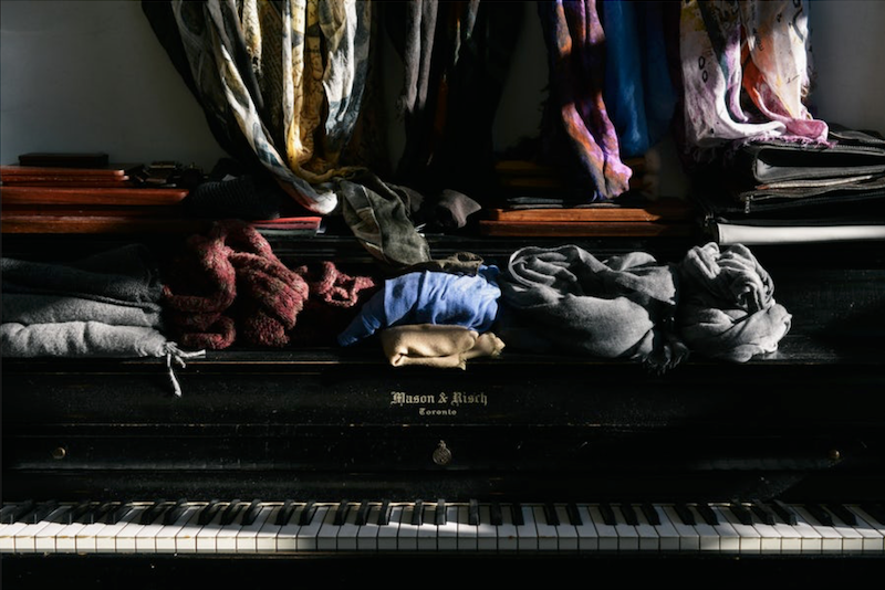 old clothes on a piano