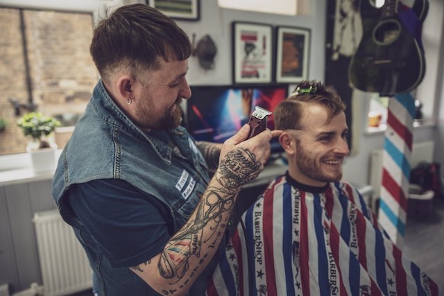 STU WALLWORK-WALSH working in barbershop