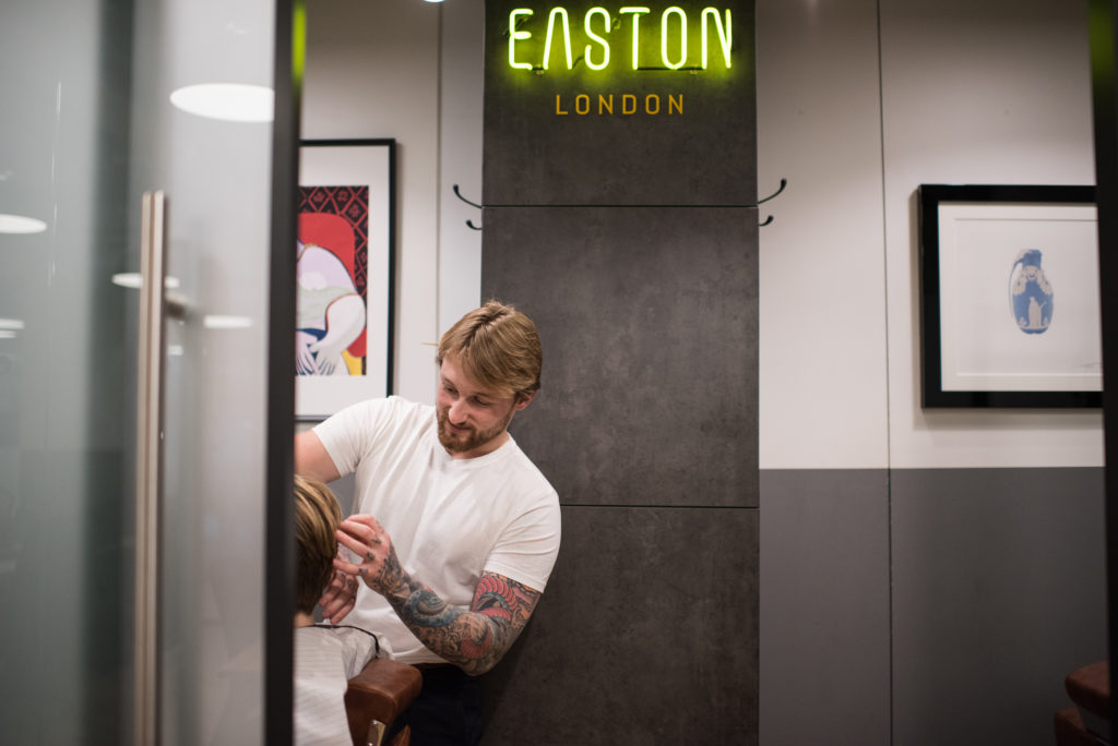 man barbering at easton london